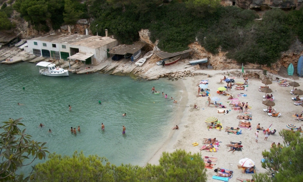 Cala Pi property buyers enjoying a local beach.