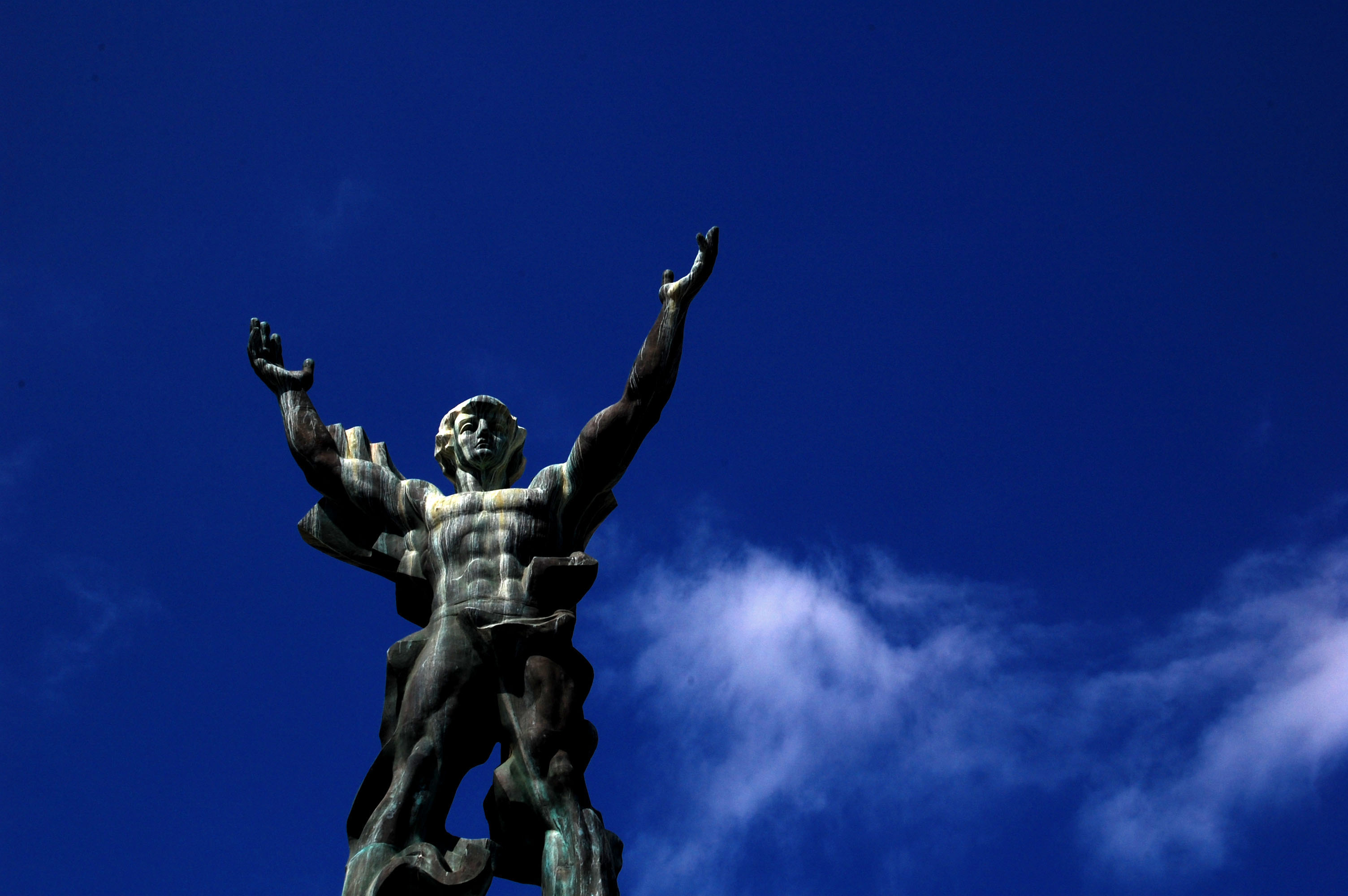 Statue in Puerto Banus with blue sky in the background