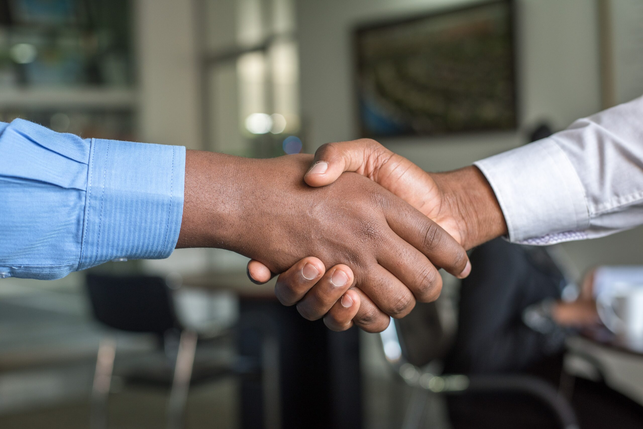Handshake to seal a real estate deal