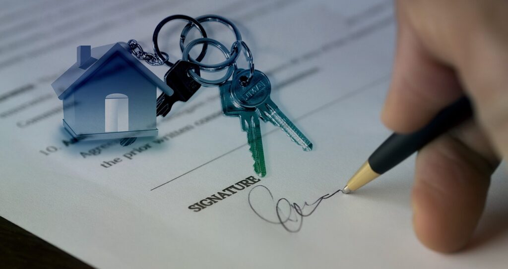 persona que firma el contrato de compra de una propiedad